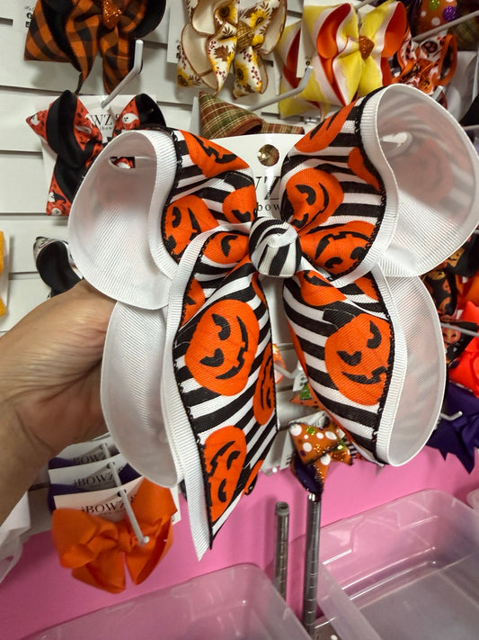 Extra Large striped jack o lantern Halloween iBOWZ hair bow